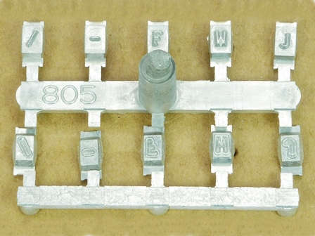 22805 Marca de ceca CARACTERES, OCR, GÓTICO STD, RELIEVE, / - F W J, P&D   